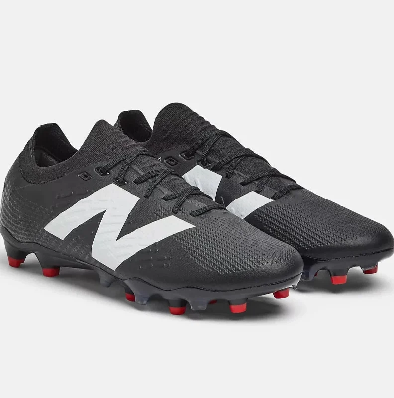 NEW BALANCE TEKELA PRO LOW FG V4+ FOOTBALL BOOTS