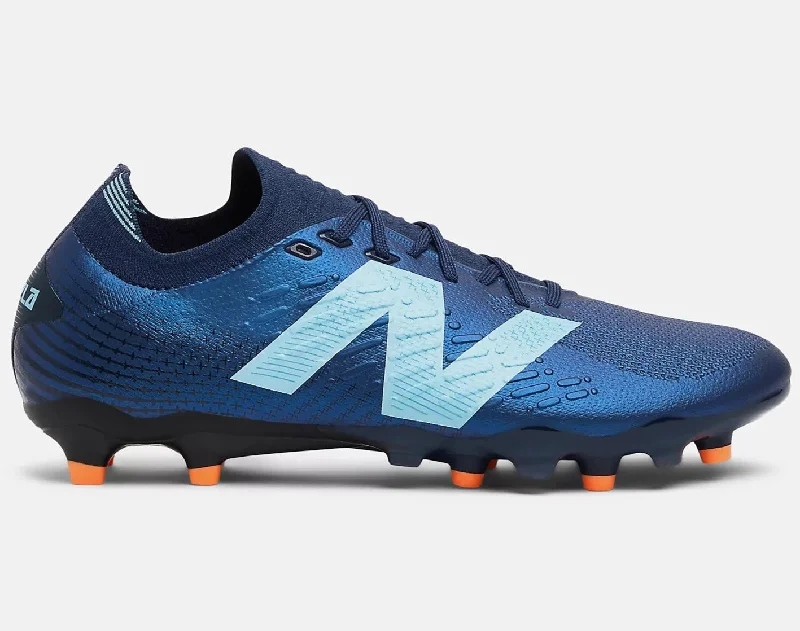 NEW BALANCE TEKELA PRO LOW FG V4+ FOOTBALL BOOTS